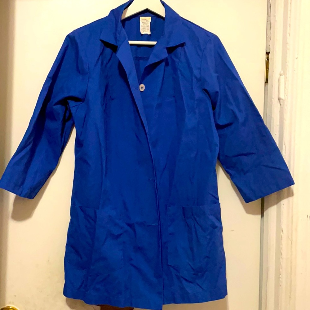 Blue tunic with white buttons